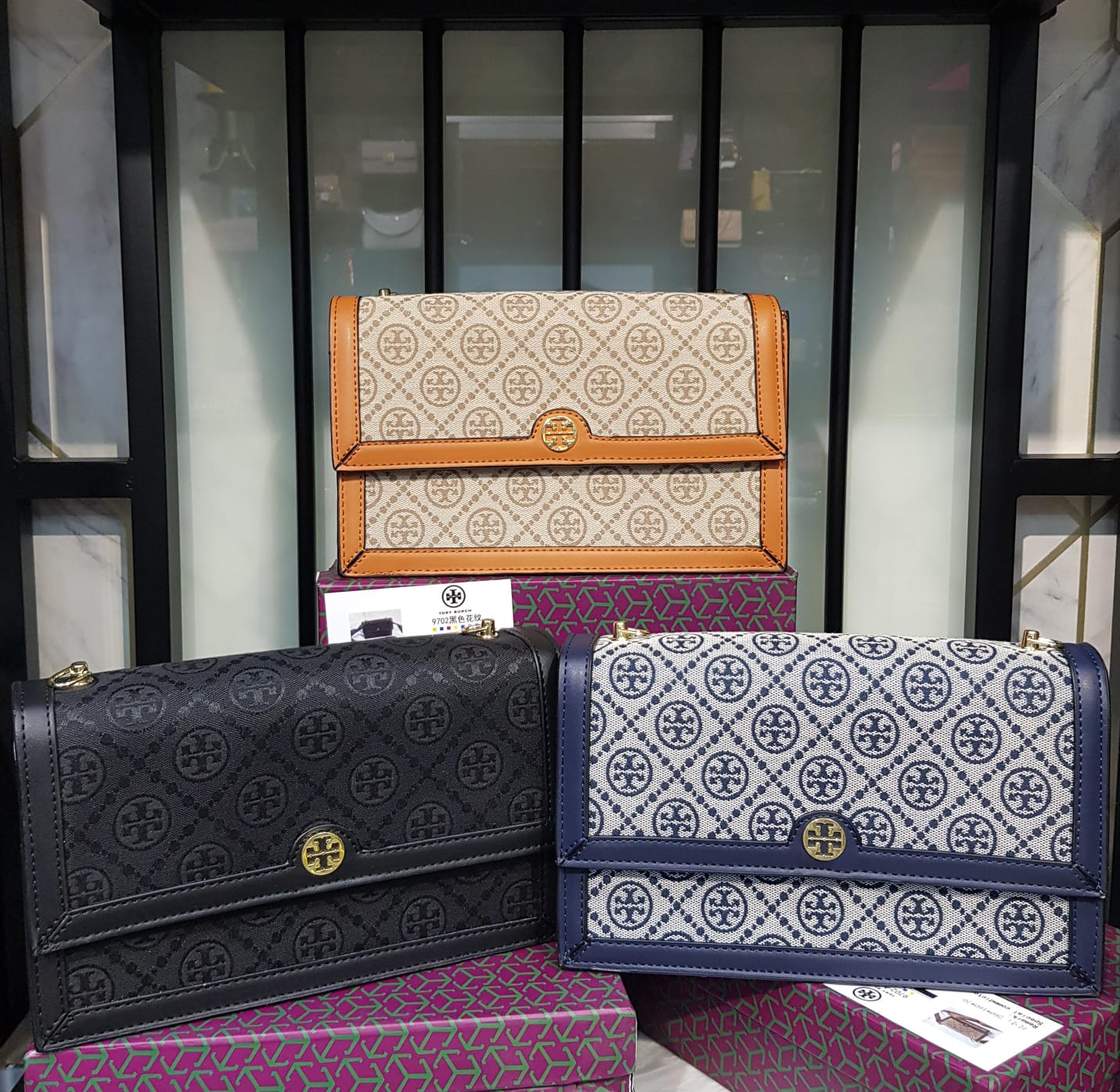 Tory Burch 
T Monogram Jacquard Mini Crossbody Bag